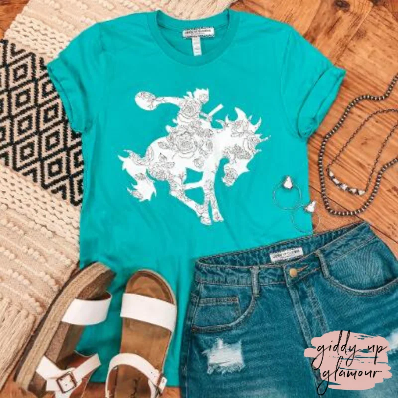 Women's Slouchy T-Shirts-Tough Buck Saddle Bronc Graphic Tee in Turquoise